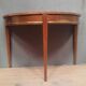 Louis XVI style console in mahogany.