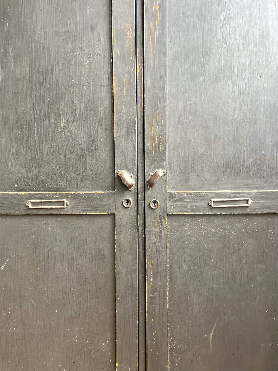 Old wooden locker with black patina