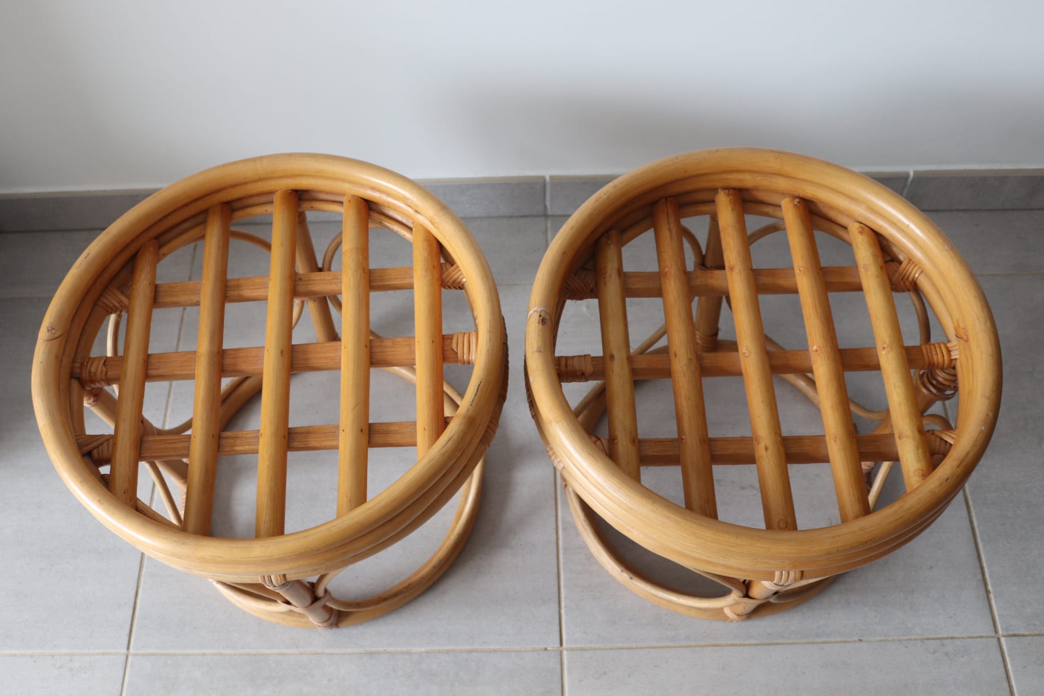 Two vintage rattan ottomans