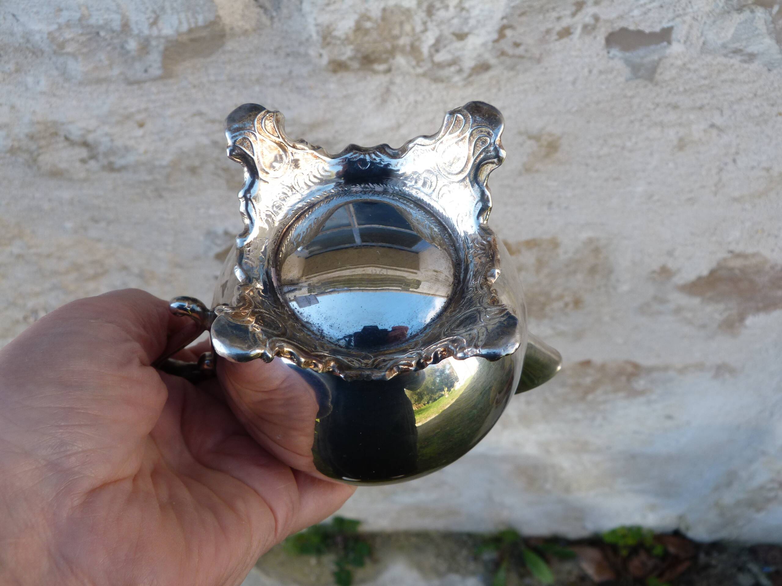 Old silver-plated metal milk or cream jug