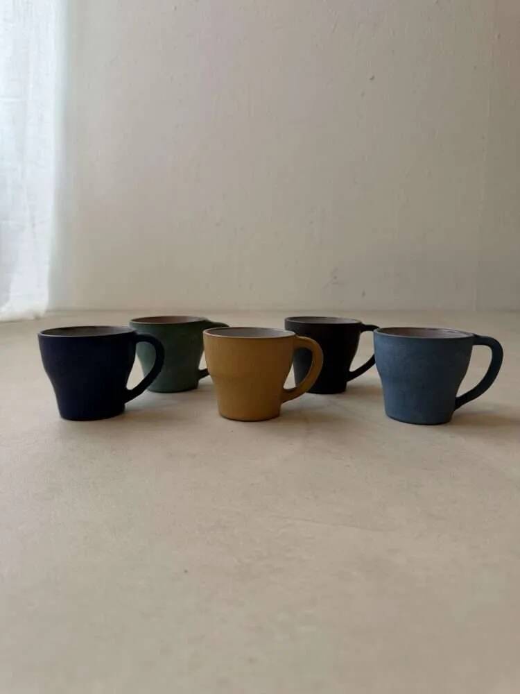Set of five mugs from a 1960s Scandinavian studio.