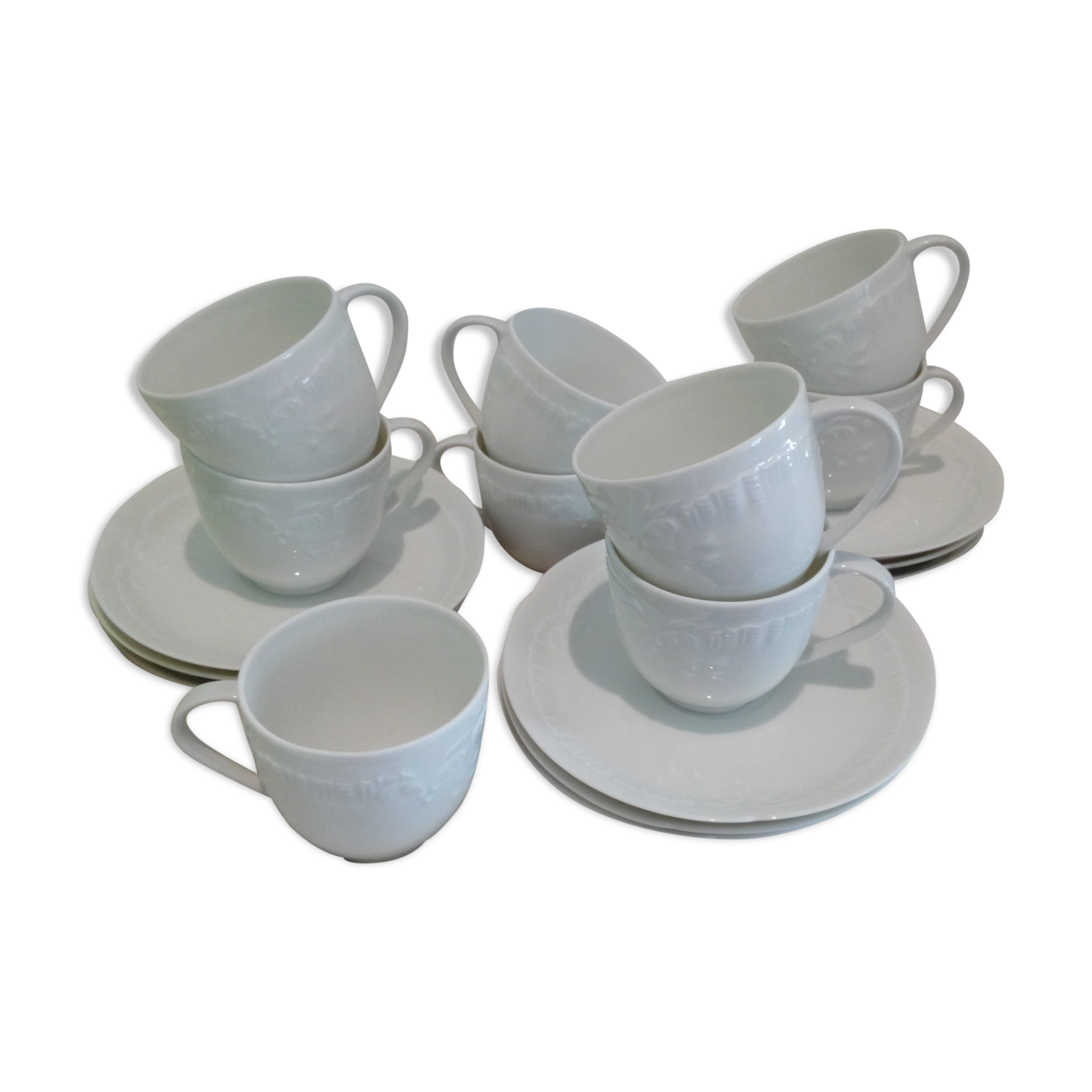 Set of 9 white porcelain coffee cups