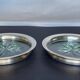2 Bottle coasters in cut glass and silver metal