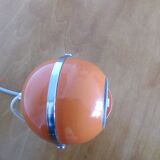 Orange and chrome eyeball table lamp