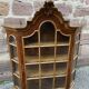 Vitrine suspendue style baroque noyer vers 1950