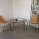 Round chrome and smoked glass coffee table