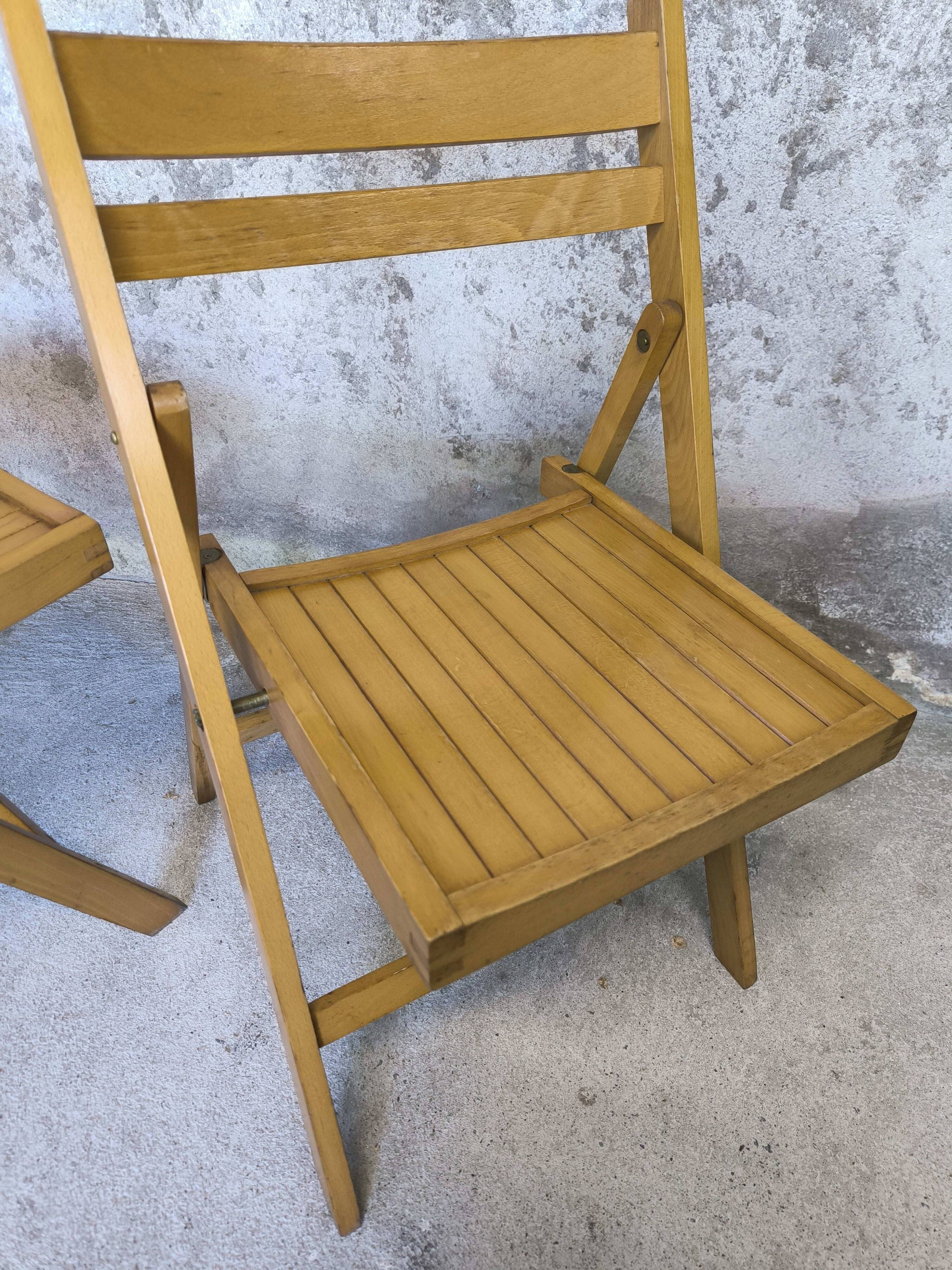 Pair of vintage folding wooden chairs