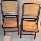 Pair of caned folding chairs from the 1960s in varnished wood.