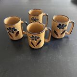 Set of 4 floral decorated mugs