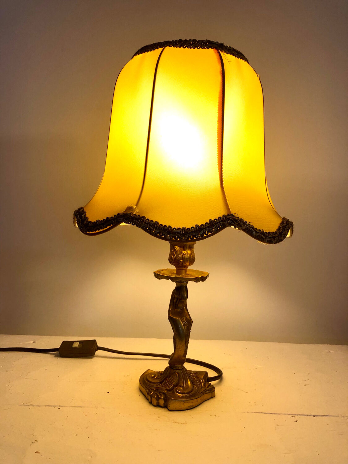 Old table lamp in gilded bronze.
