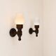 Pair of vintage wall sconces, wood and opaline, France, 1970.
