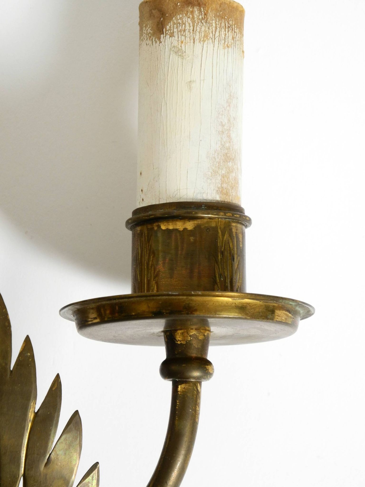 A pair of mid-century modern brass wall lamps by Vereinigte Werkstätten