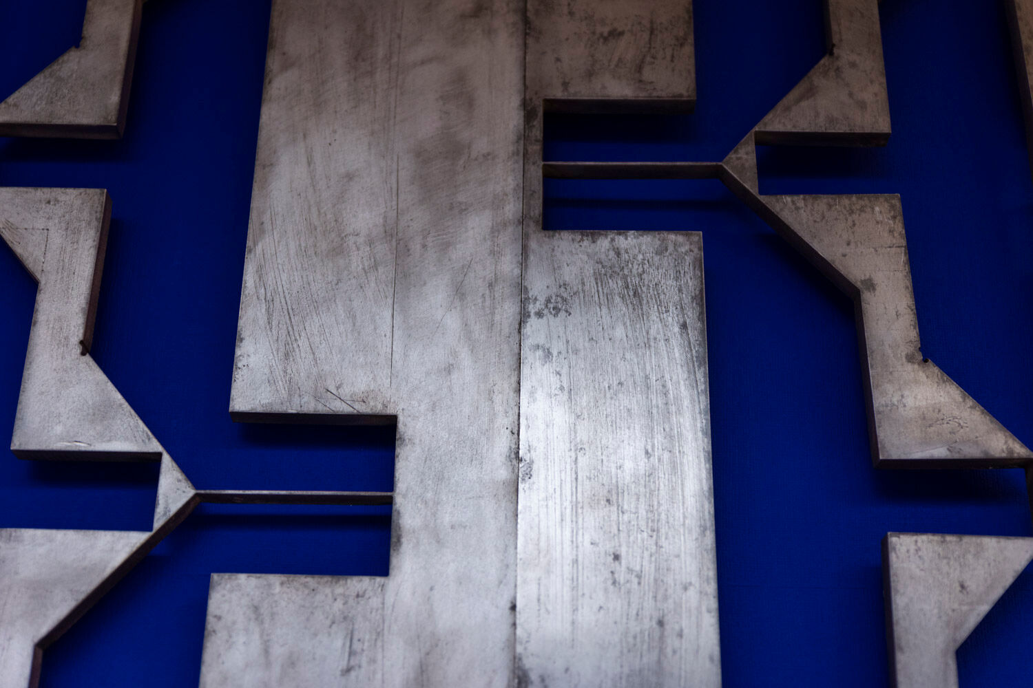 Pair of cast aluminum panels, 1970s