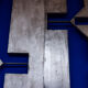 Pair of cast aluminum panels, 1970s