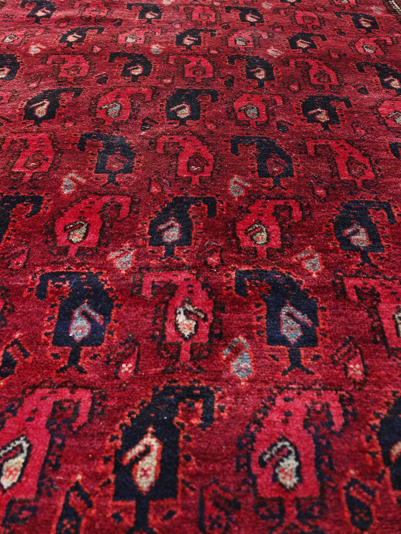 Vintage hand-knotted Boteh rug in natural wool from Afghanistan, 1960s.