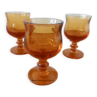 Set of 3 antique amber glass goblets made of blown glass