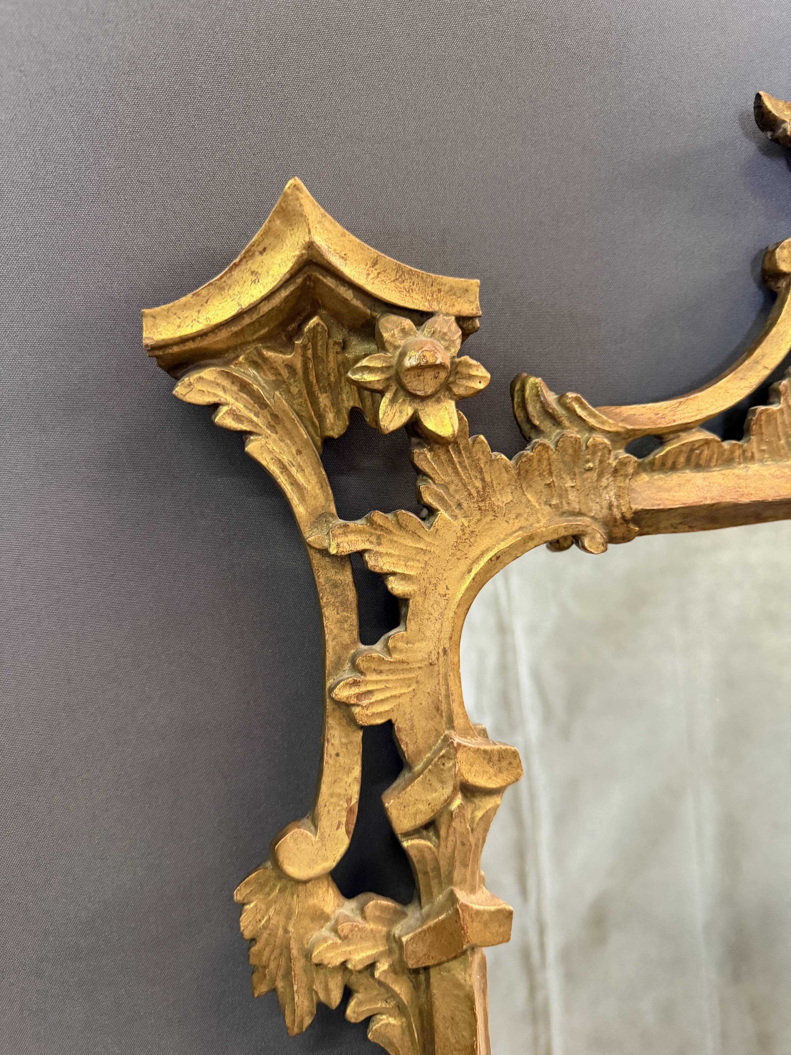 Italian mirror in gilded wood from the 19th century.