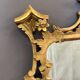 Italian mirror in gilded wood from the 19th century.