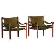 Arne Norell, Pair of "Sirocco" Safari armchairs in ash and green leather, 1960s.