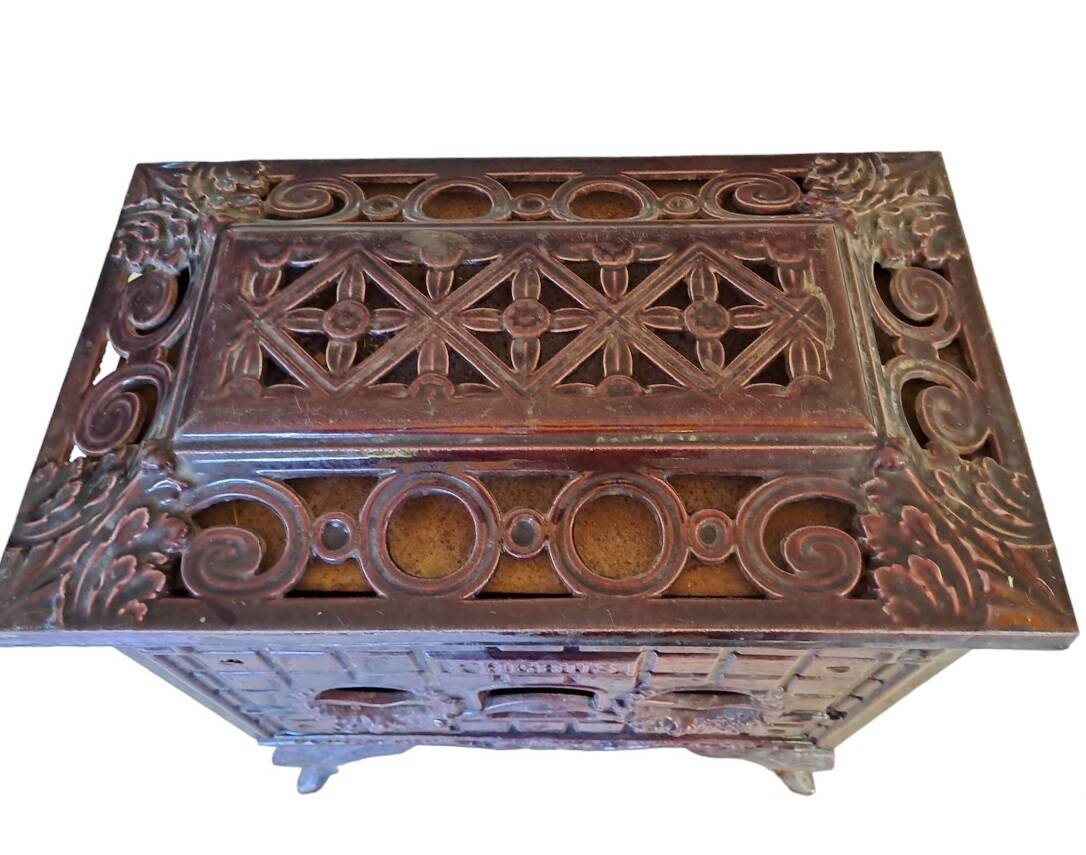 Antique enameled cast iron art deco wood stove, Phebus brand, aubergine color