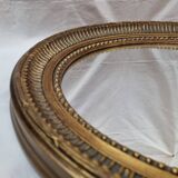 Oval wooden mirror, gold 49x39cm