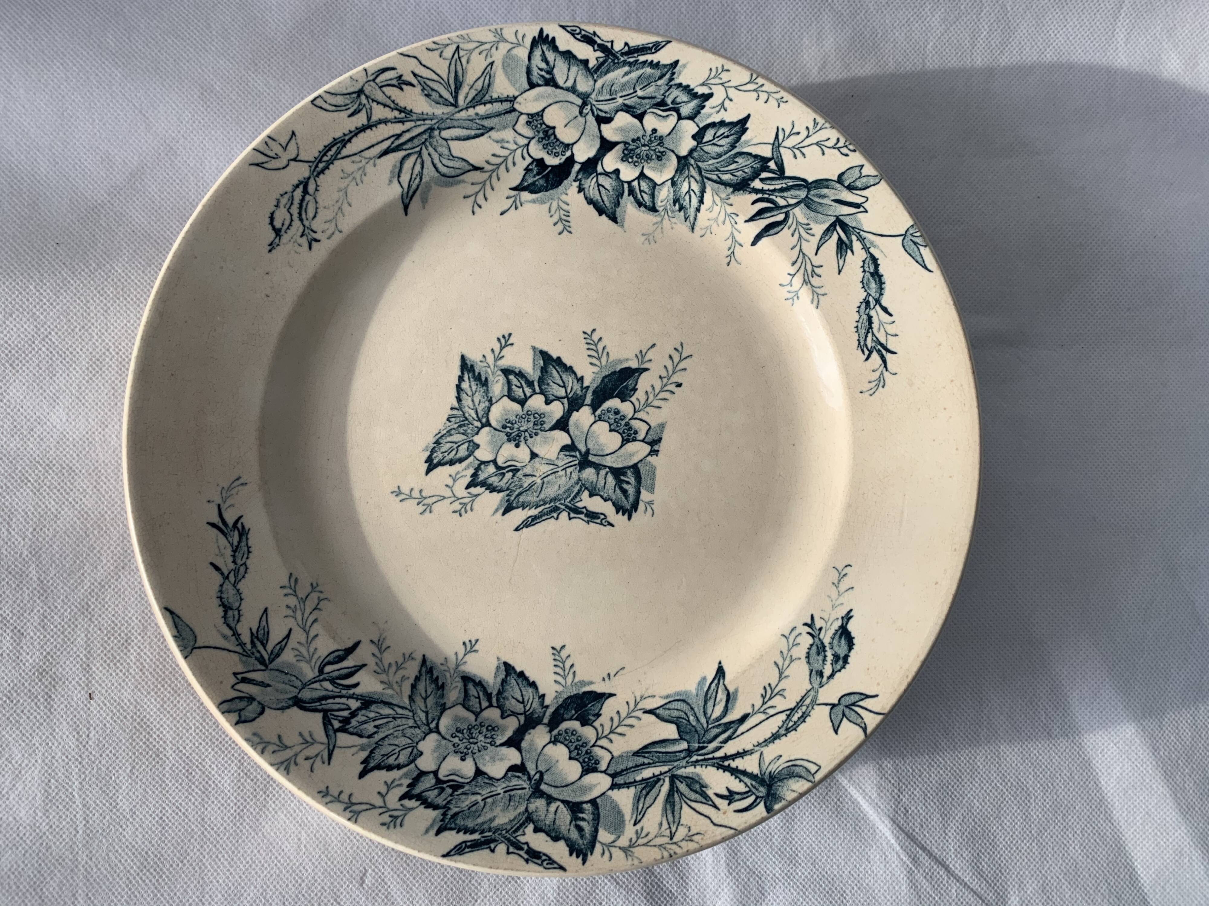 8 plates and an old compoter Terre de Fer HB and Co.