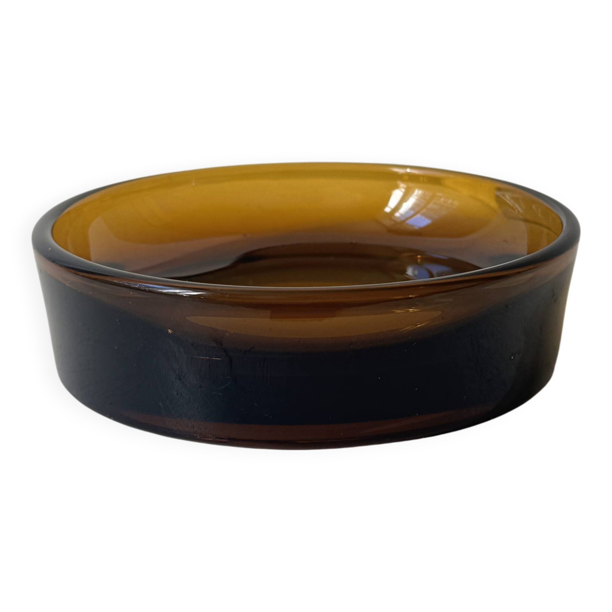 Smoked glass catchall fully tinted in amber.
