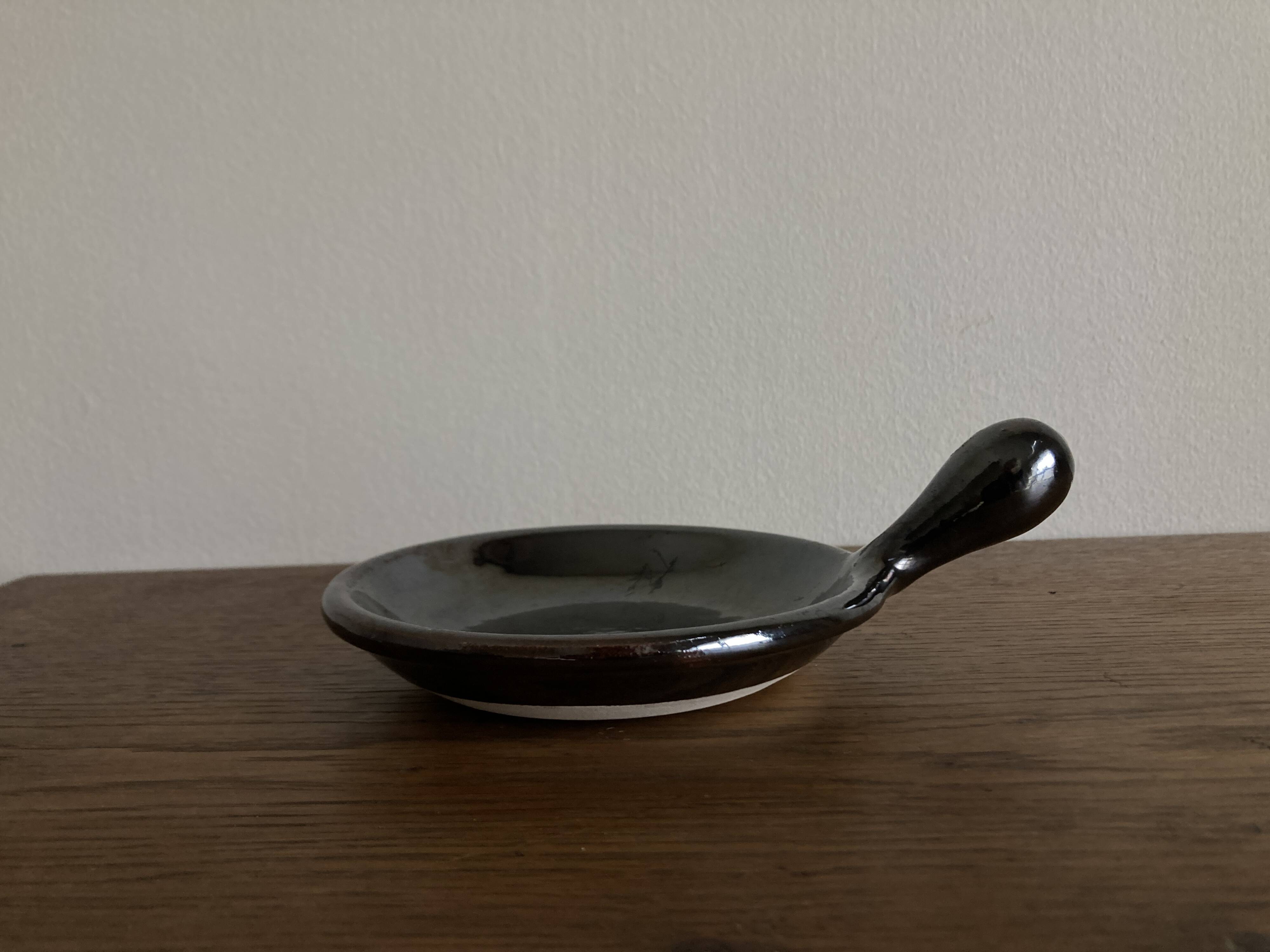 Black glazed earthenware dish 1960