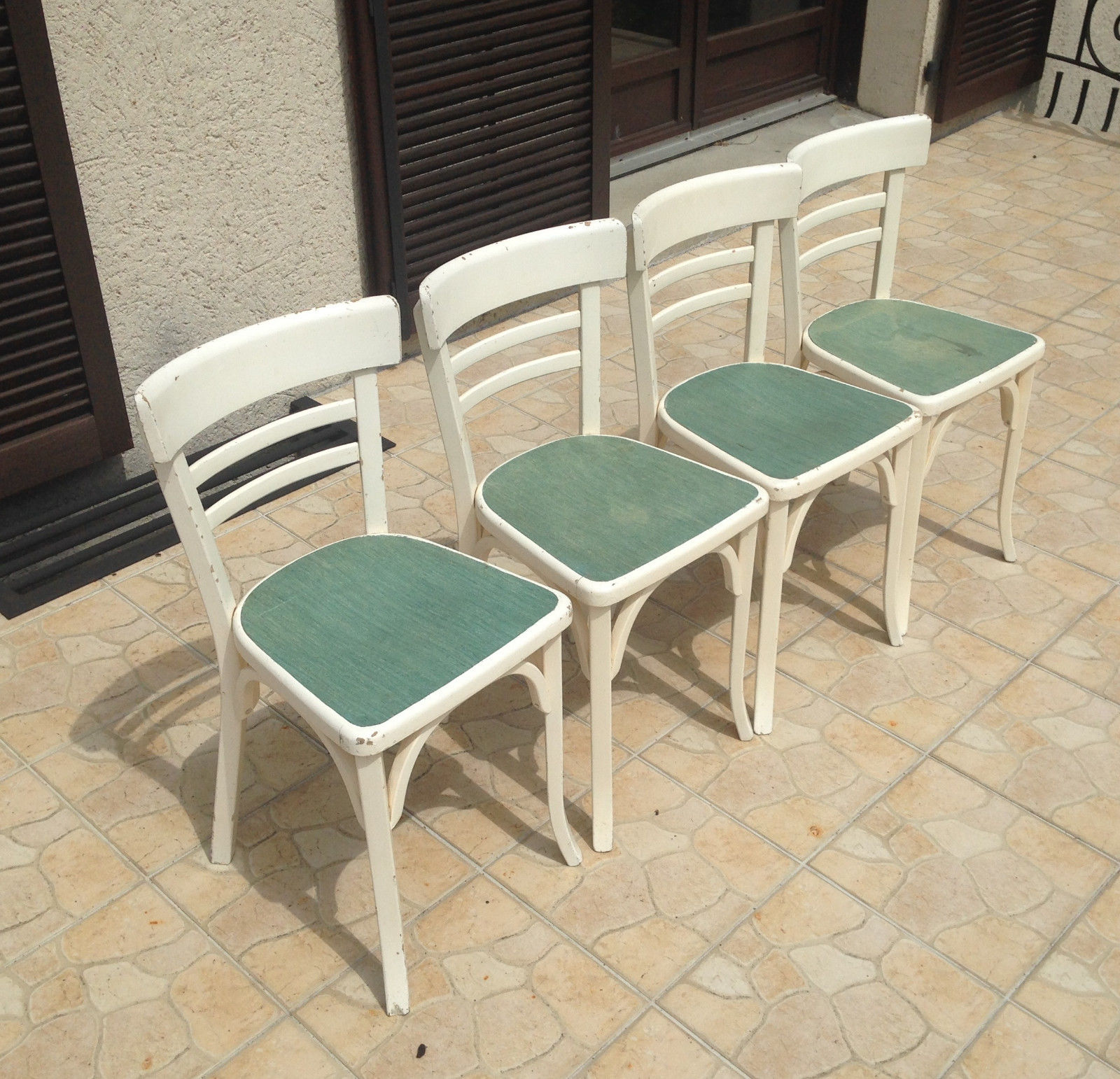 Ensemble de 4 chaises bistrot anciennes des années 50