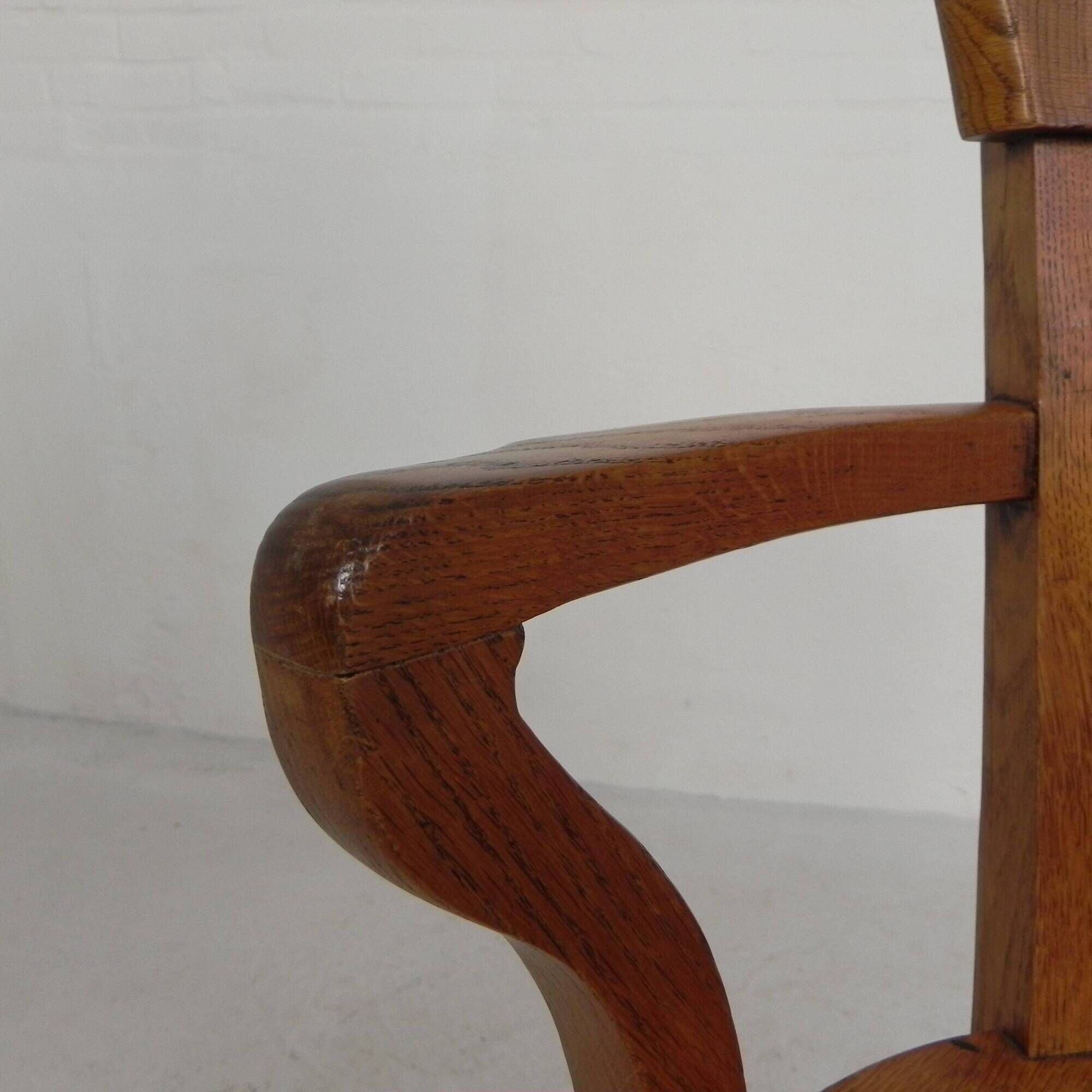 Oak office chair with adjustable spring system and height adjustment, 1950s.