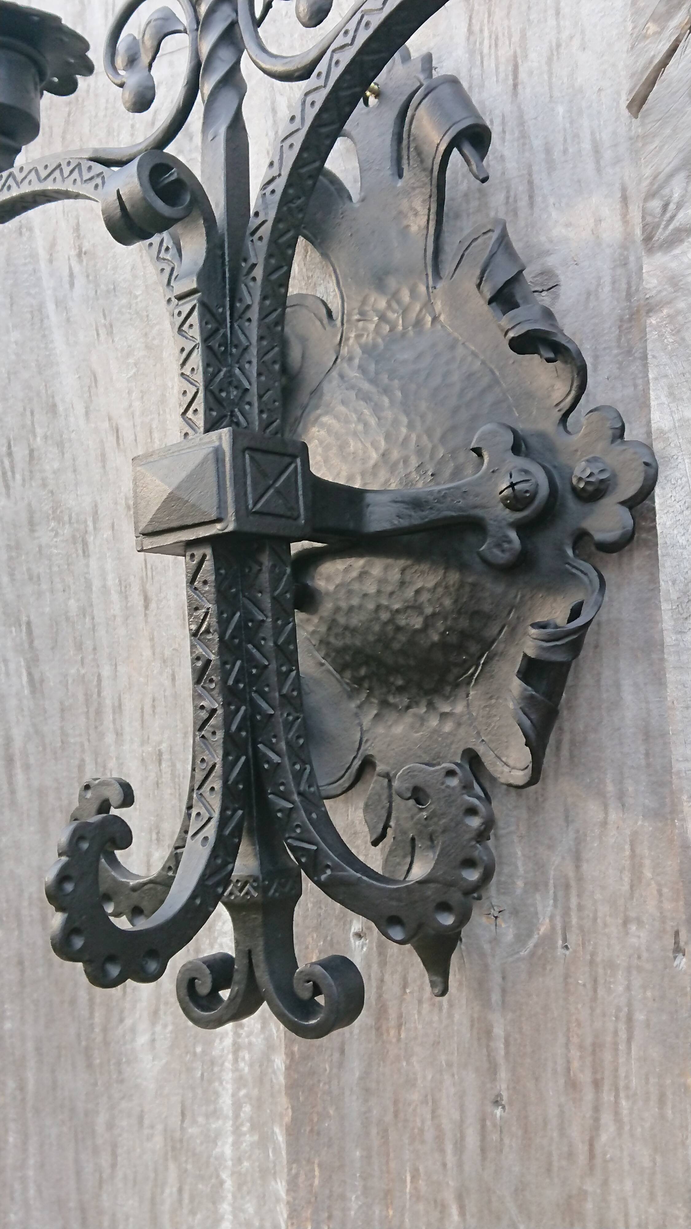 Pair of black wrought iron sconces - neo-Gothic style - from the 1950s