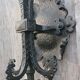 Pair of black wrought iron wall sconces - neo-Gothic style - from the 1950s