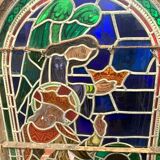 Stained glass panel representing a nineteenth century coronation