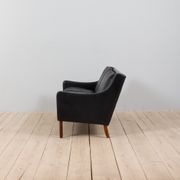 Danish black leather and rosewood sofa