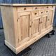 Scandinavian natural pine sideboard with 4 doors and 6 drawers.