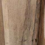 Lit ancien en bois brut