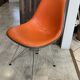 Eames Herman Miller DSR Eiffel chair in orange greige fibreglass and skai.