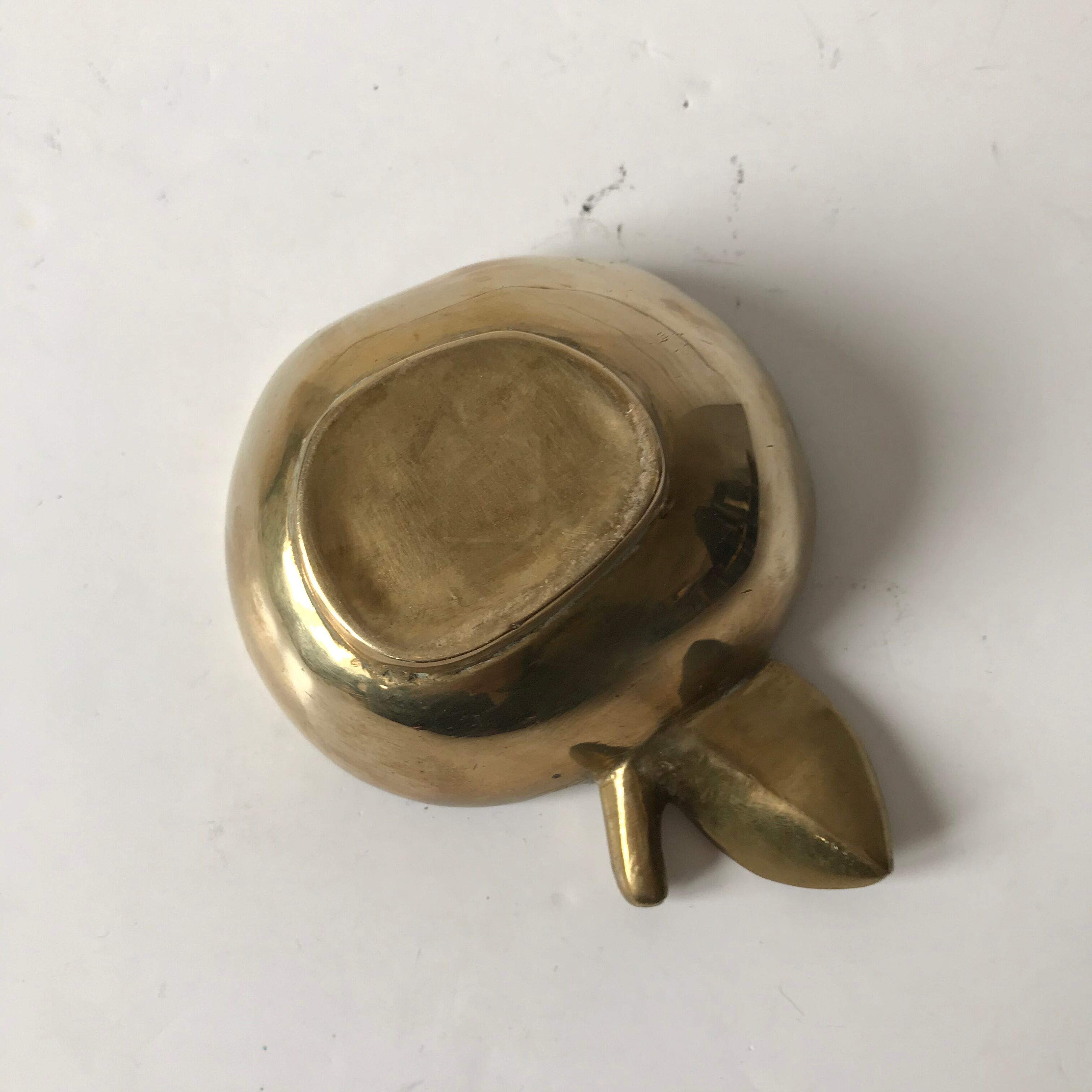 Apple brass ashtray