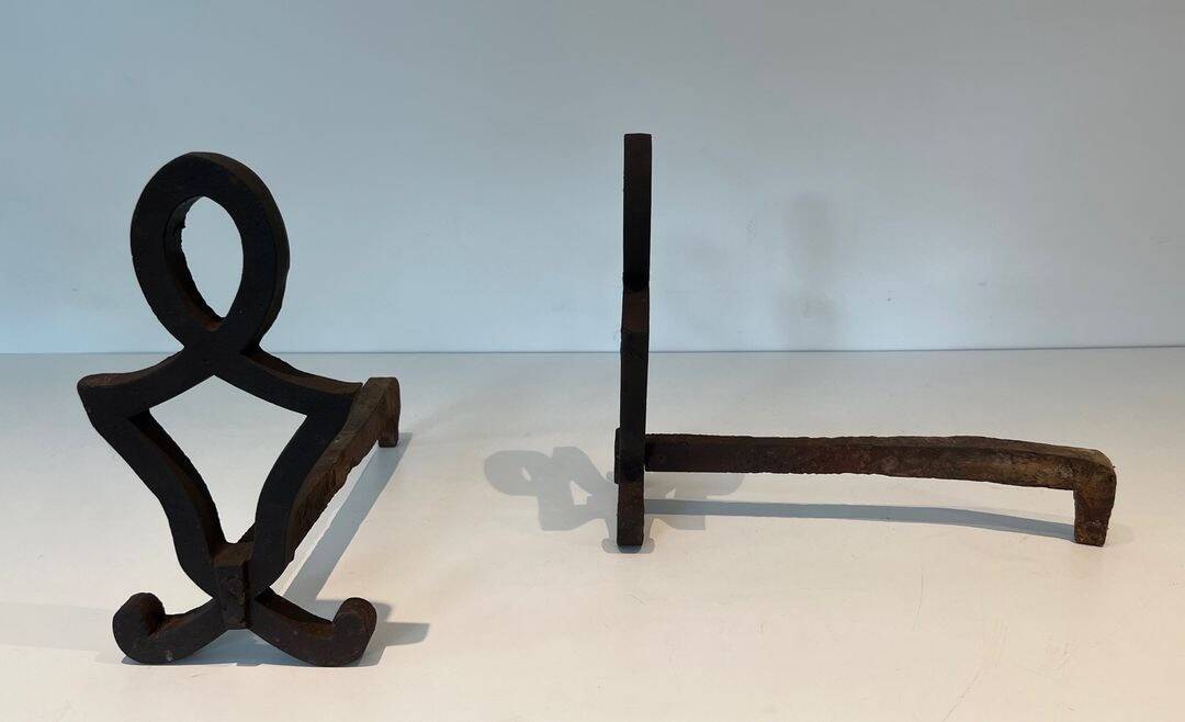 Pair of Modernist Andirons in Cast Iron with Stylised Figure Supports, by Ray