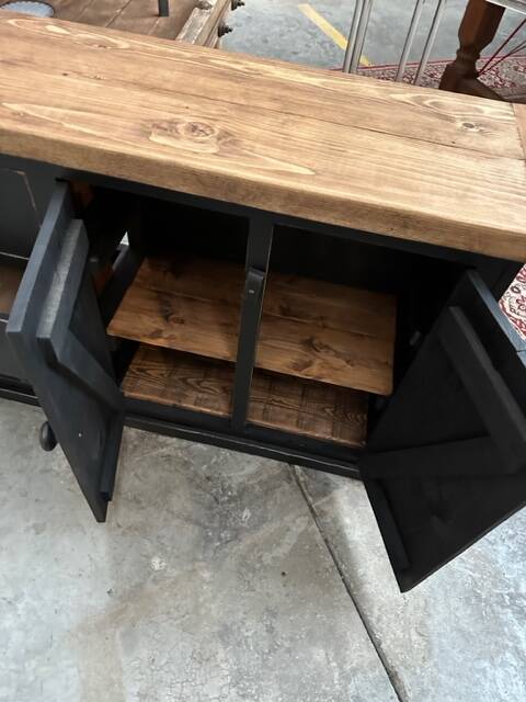 Old piece of furniture transformed into a TV stand