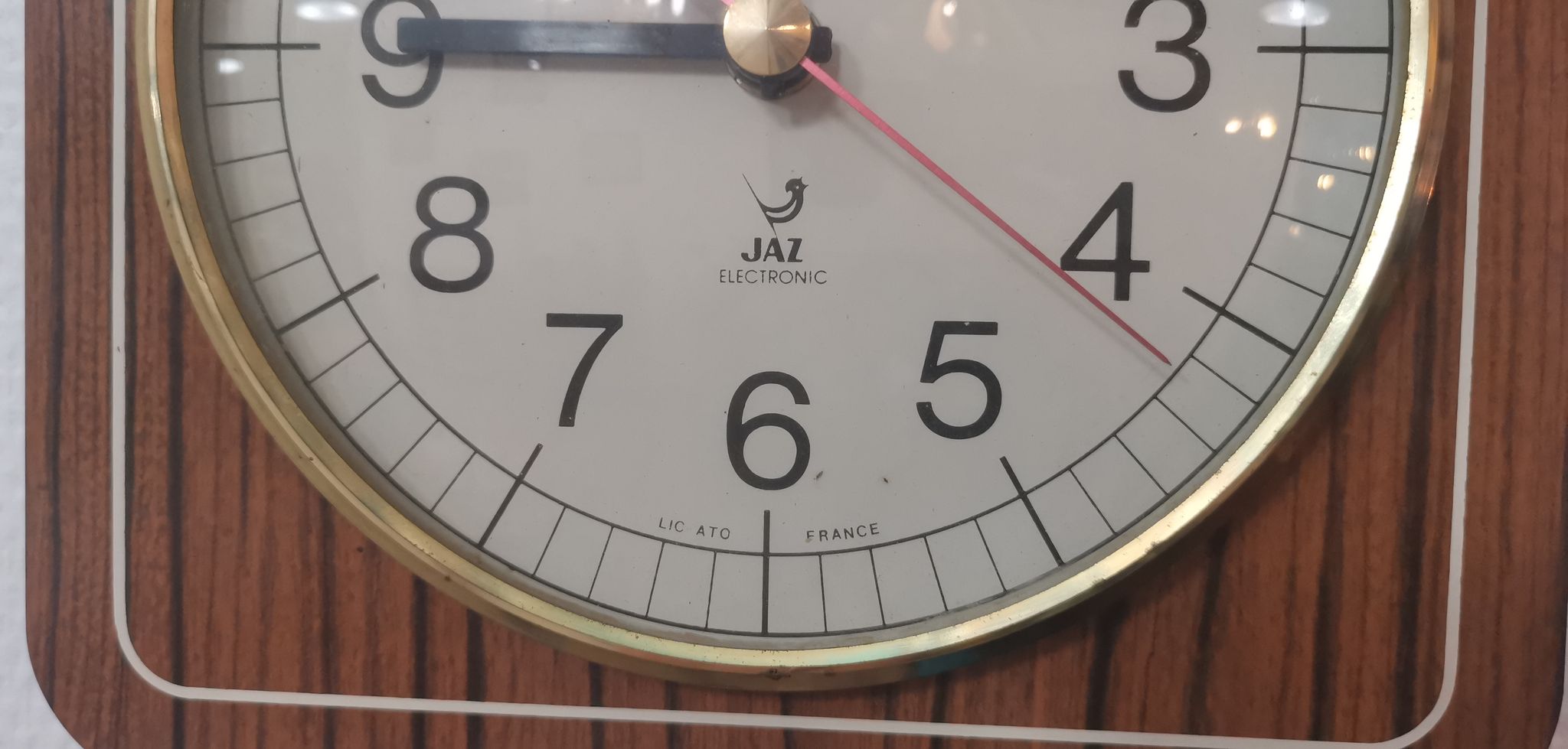 Old wall clock jaz quartz wall clock in formica brown 1960s