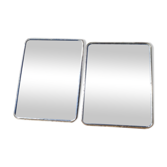 Duo of barber mirrors to pose