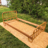 Rattan bed.