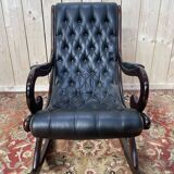 Fauteuil basculant Chesterfield en cuir noir
