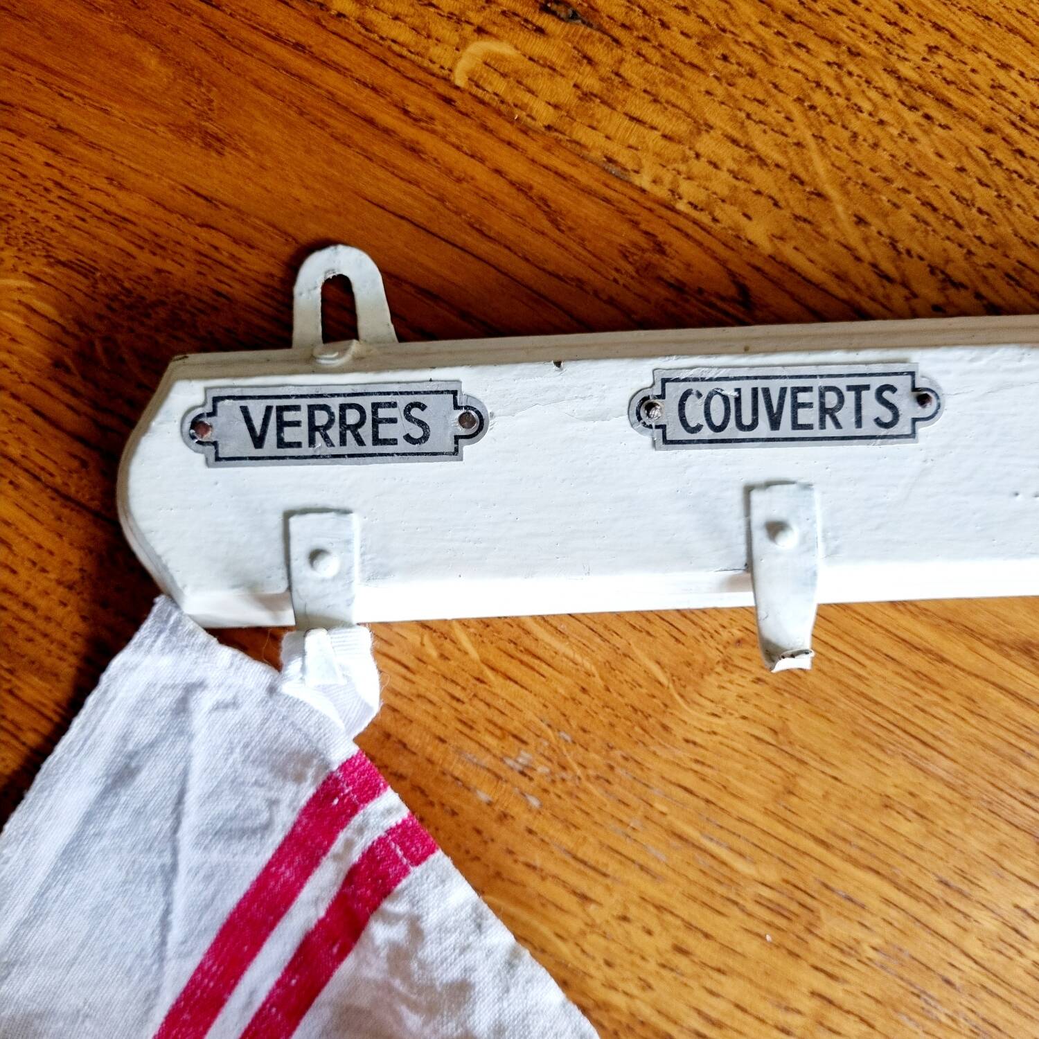 Old coat hook tea towel holder