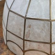 Suspension in white mother-of-pearl and brass