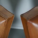 Pair of French Cognac Moustache Back Leather Club Chairs, 1950s