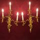 Pair of gilded bronze wall sconces in Rococo style, three lights.