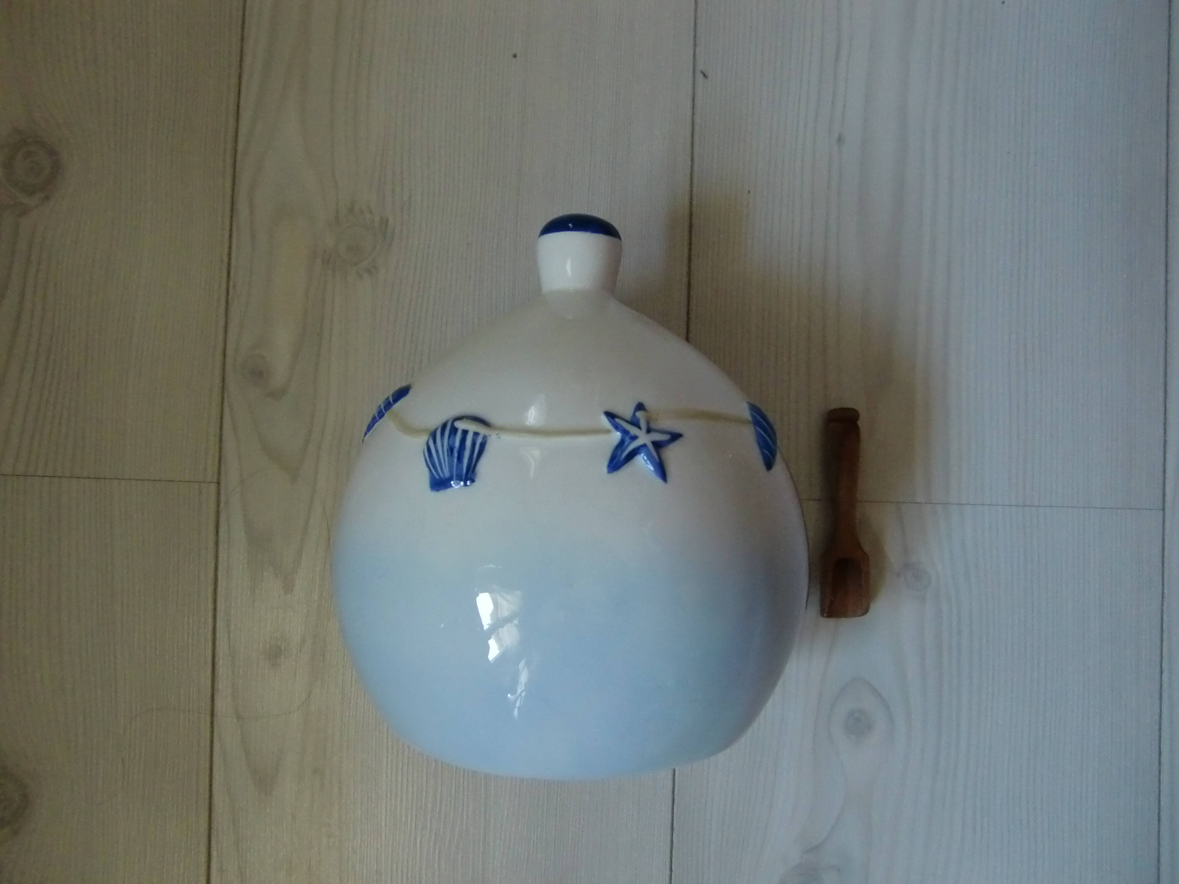 Ceramic salt pot and wooden spatula