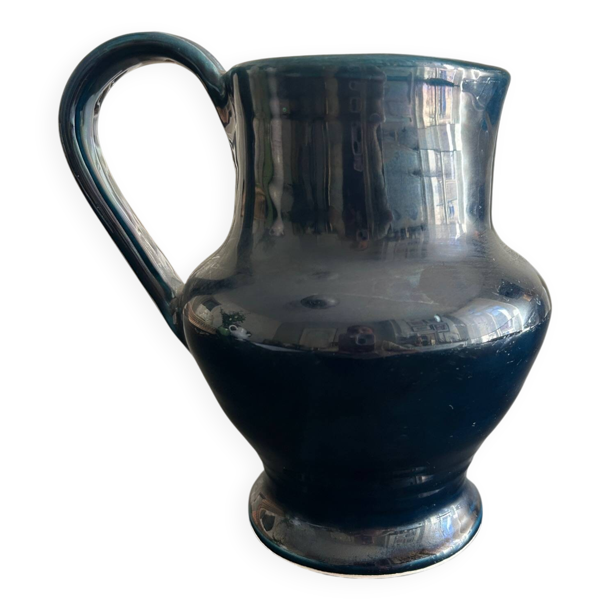 blue pitcher the potter chin